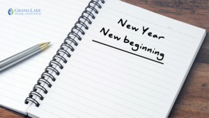 notebook with words New Year New Beginning